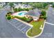 Aerial view of the community pool with lounge chairs surrounded by lush landscaping, perfect for relaxation at 2169 Shady Pond Dr, Clover, SC 29710