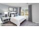 Cozy bedroom with ample natural light and neutral decor at 221 Paige Rd, Kings Mountain, NC 28086