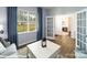 Cozy living room with a large window, neutral decor, and French doors leading to another room at 221 Paige Rd, Kings Mountain, NC 28086