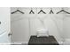 Walk-in closet with shelving and a bench with decorative pillow at 221 Paige Rd, Kings Mountain, NC 28086
