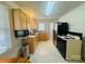 Efficient kitchen with stainless steel appliances, warm cabinets, and natural light at 2357 28Th Ne St, Hickory, NC 28601