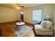 Cozy living room featuring hardwood floors, fireplace, and neutral toned furniture at 2357 28Th Ne St, Hickory, NC 28601
