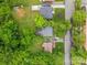 Aerial view highlighting residential properties amidst mature trees and greenery, showing their proximity at 2536 Bancroft St, Charlotte, NC 28206