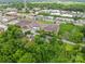 Aerial view showing lush greenery, nearby businesses and quaint homes, set in a convenient and accessible area at 2536 Bancroft St, Charlotte, NC 28206