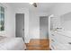 Bedroom with neutral walls, hardwood floors, and ample closet space at 2536 Bancroft St, Charlotte, NC 28206