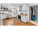 Bright kitchen featuring white cabinets, stainless steel appliances, and butcher block countertops at 2536 Bancroft St, Charlotte, NC 28206
