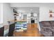 Bright living area flows into an updated kitchen with a butcher block countertop peninsula at 2536 Bancroft St, Charlotte, NC 28206