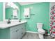 Bathroom features double sinks, white countertops and sea green walls at 2601 Marldale St, Gastonia, NC 28052