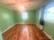 Bedroom filled with lots of natural light coming through the large windows and hardwood flooring at 2601 Marldale St, Gastonia, NC 28052