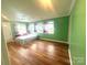 Bedroom with windows, bed and hard wood flooring at 2601 Marldale St, Gastonia, NC 28052