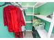 Walk-in closet with shelves, hanging clothes and green walls at 2601 Marldale St, Gastonia, NC 28052