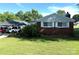 Charming brick home with well-maintained lawn and carport at 2601 Marldale St, Gastonia, NC 28052
