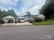 Charming single Gathering home with two carports, manicured lawn and mature landscaping at 2601 Marldale St, Gastonia, NC 28052