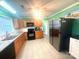 Kitchen featuring granite countertops, stainless steel appliances, and tile flooring at 2601 Marldale St, Gastonia, NC 28052