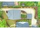 The property features a well-manicured lawn, a long driveway, lush landscaping, and mature trees at 2829 Holt St, Charlotte, NC 28205