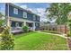 Well-maintained backyard with lush lawn and landscaped garden beds at 2829 Holt St, Charlotte, NC 28205