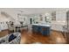Bright open kitchen with oversized island, eat-in dining area and stainless appliances at 2829 Holt St, Charlotte, NC 28205