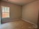 Unfinished bedroom featuring natural light from the window at 2914 Waterford Ln # 33A, Albemarle, NC 28001