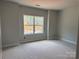 Bedroom with large window offering plenty of natural light at 2914 Waterford Ln # 33A, Albemarle, NC 28001