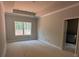 Bright bedroom features window and tray ceiling at 2914 Waterford Ln # 33A, Albemarle, NC 28001