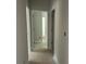 View down light and airy hallway with doors on either side at 2914 Waterford Ln # 33A, Albemarle, NC 28001