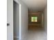 Hallway with view to the outdoors through a window at 2914 Waterford Ln # 33A, Albemarle, NC 28001