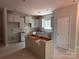 Kitchen area with new cabinets and an island at 2914 Waterford Ln # 33A, Albemarle, NC 28001