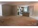Open living area with view to the kitchen at 2914 Waterford Ln # 33A, Albemarle, NC 28001