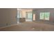 Open living area with view to outdoors and an island at 2914 Waterford Ln # 33A, Albemarle, NC 28001