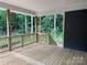 An elevated porch overlooks a woodland area, offering a tranquil escape and serene views at 2915 Noritake Trl # 71, Albemarle, NC 28001