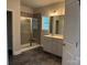 This new bathroom features a glass shower, vanity with mirror, and gray tile flooring at 2915 Noritake Trl # 71, Albemarle, NC 28001
