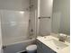 Clean bathroom featuring a shower-tub combo, vanity sink, and tile flooring at 2915 Noritake Trl # 71, Albemarle, NC 28001