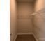 This walk-in closet features shelving, carpet, and sufficient storage for clothes and accessories at 2915 Noritake Trl # 71, Albemarle, NC 28001
