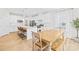 Open-concept kitchen with island seating, stainless steel appliances, and a dining area at 3110 Streamside Dr, Davidson, NC 28036