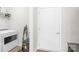 Functional laundry area with a washing machine, shelving, and convenient access to an exterior door at 3110 Streamside Dr, Davidson, NC 28036