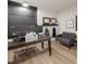 Home office with desk, dual monitors, and comfortable seating area for a productive workspace at 3110 Streamside Dr, Davidson, NC 28036