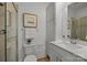 Modern bathroom featuring glass-door shower, toilet, and elegant fixtures at 3128 Butler Hill Dr, Matthews, NC 28105