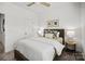 Cozy bedroom with neutral tones, decorative pillows, and stylish bedside tables at 3128 Butler Hill Dr, Matthews, NC 28105
