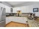 Charming kitchen featuring granite counters, stainless appliances, and ample cabinet space at 3128 Ethereal Ln, Charlotte, NC 28226