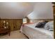 Cozy bedroom featuring carpet floors, wood paneled walls, and a comfortable bed at 328 E Center Ave, Mooresville, NC 28115