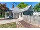 Charming house with a covered porch and well lit back entrance at 328 E Center Ave, Mooresville, NC 28115