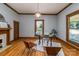 Charming home office with decorative fireplace, hardwood floors, and bright natural light at 328 E Center Ave, Mooresville, NC 28115