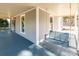 Relax on the covered porch with a swing, offering a charming outdoor space at 328 E Center Ave, Mooresville, NC 28115