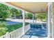 Relax on the covered porch with a swing, offering a charming outdoor space at 328 E Center Ave, Mooresville, NC 28115