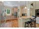 Well-equipped kitchen with stainless steel appliances and a granite island at 335 Whisper Lake Dr, New London, NC 28127