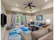 Comfortable living room with plush seating, neutral tones, and natural light at 335 Whisper Lake Dr, New London, NC 28127