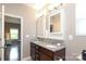 Well-lit bathroom with granite counters and and sinks at 363 Bellingrath Blvd, Rock Hill, SC 29730