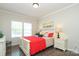 Bright bedroom with a large window and white wood furniture at 363 Bellingrath Blvd, Rock Hill, SC 29730