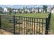 Fenced community space with a bench and views of the surrounding neighborhood, offering a tranquil place to relax at 363 Bellingrath Blvd, Rock Hill, SC 29730