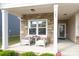 Inviting front porch with stone accents, seating, and a cozy atmosphere at 363 Bellingrath Blvd, Rock Hill, SC 29730